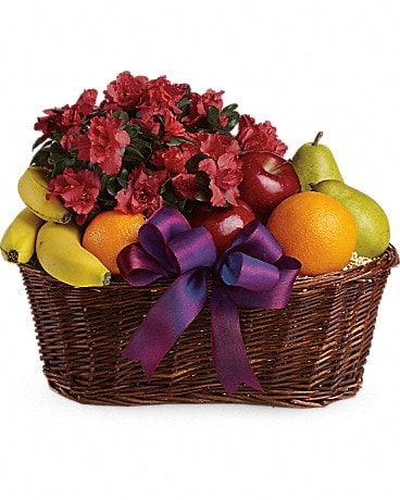 Panier cadeau de fruits et fleurs