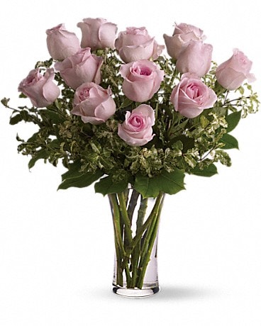 Bouquet de fleurs Une douzaine de roses roses