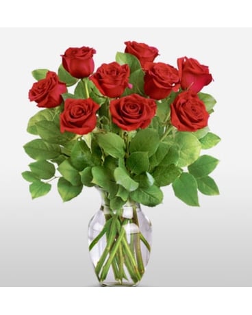 Disposition de neuf fleurs de roses rouges (avec vase)