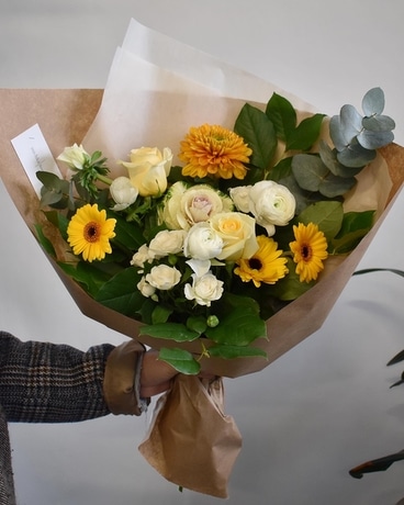 Disposition de fleurs ensoleillées Amour