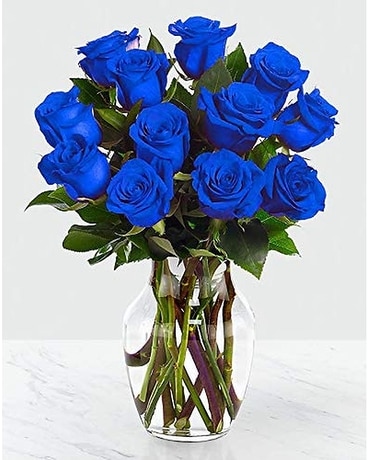 Disposition florale de roses bleues brillantes